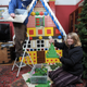 Illustration for article titled Ginormous 125,000-brick Lego gingerbread house is a Christmas miracle!